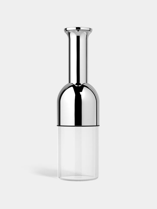 A stainless steel wine decanter with a mirror finish, featuring a long funnel and a sharp lip, with a clear glass base.